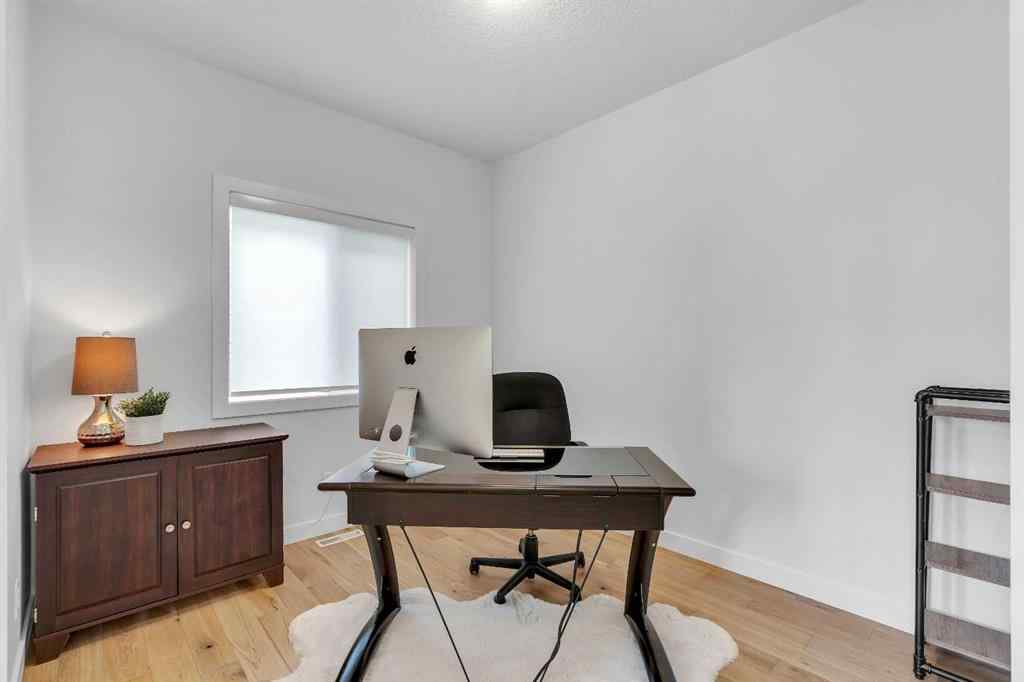 MLS® A2263179 - 2173 Ravensdun Crescent SE in Ravenswood Airdrie, Residential