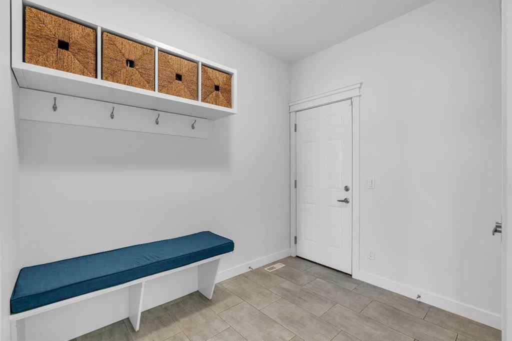 MLS® A2263179 - 2173 Ravensdun Crescent SE in Ravenswood Airdrie, Residential