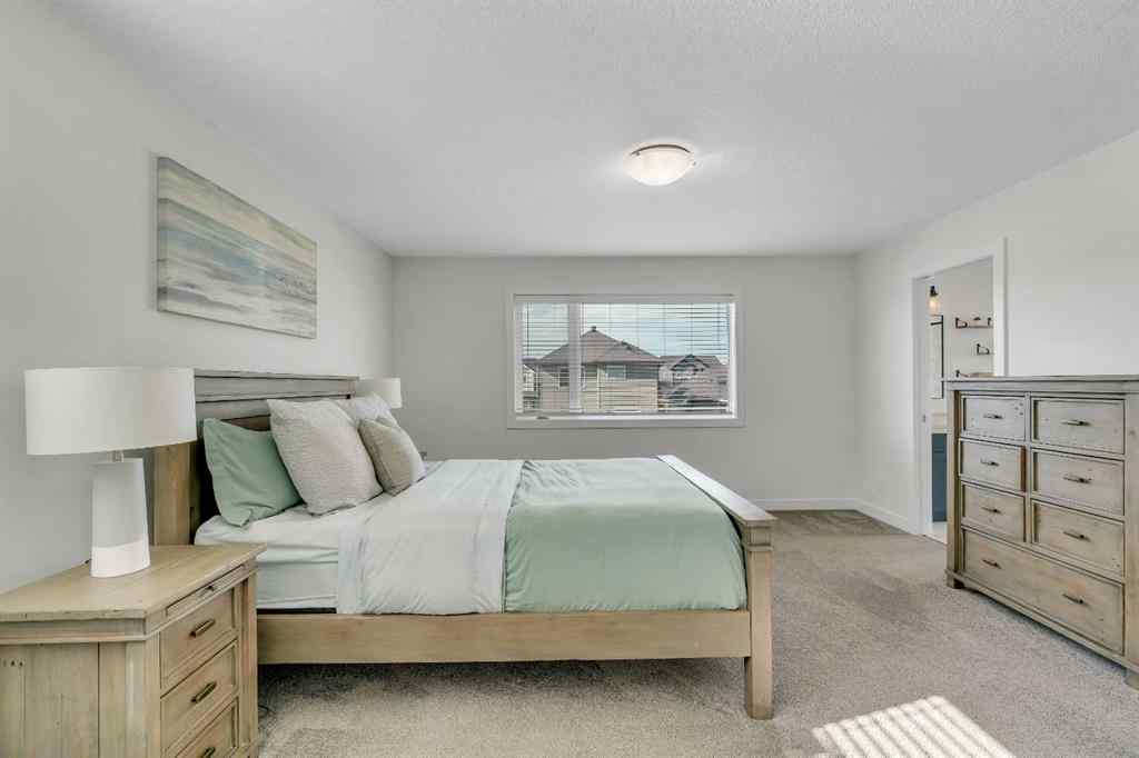 MLS® A2263179 - 2173 Ravensdun Crescent SE in Ravenswood Airdrie, Residential