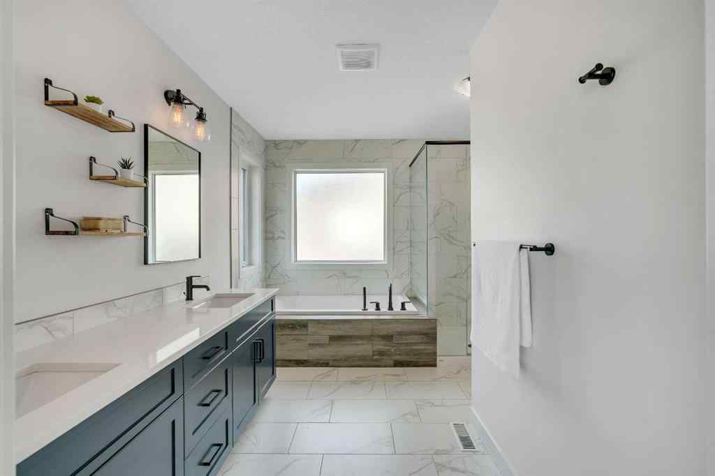 MLS® A2263179 - 2173 Ravensdun Crescent SE in Ravenswood Airdrie, Residential