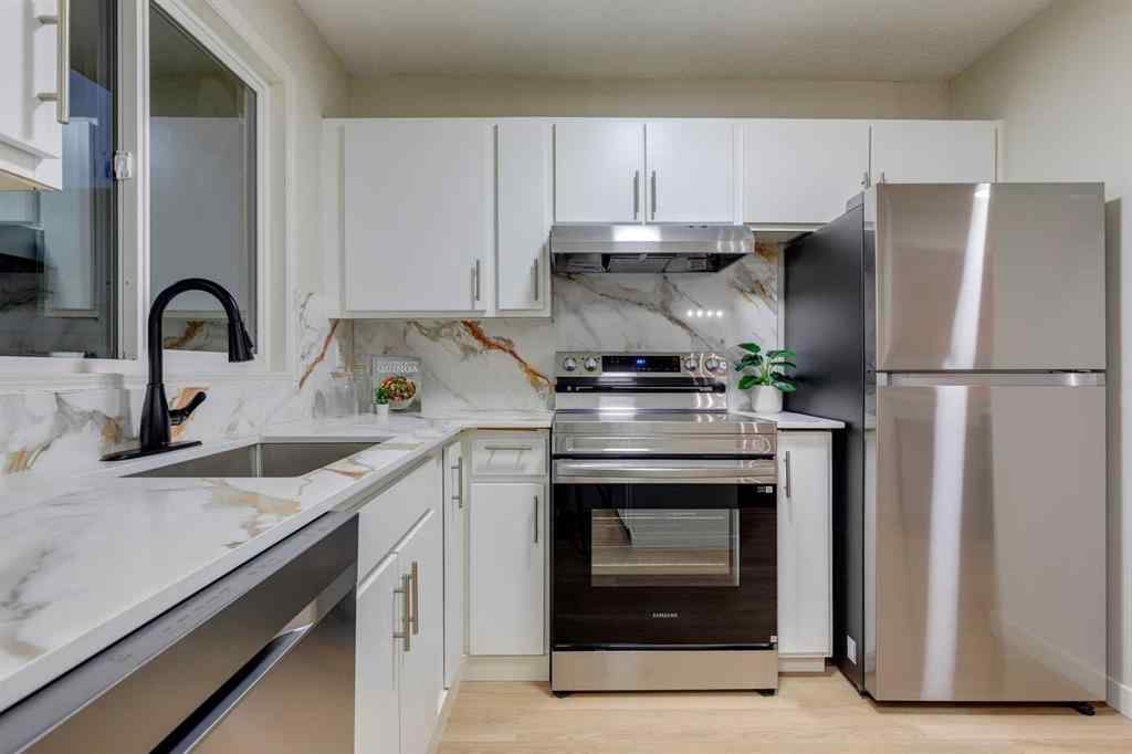 MLS&reg; # A2263188 - Unit #4 7166 18 Street SE in Ogden Calgary, Residential Open Houses