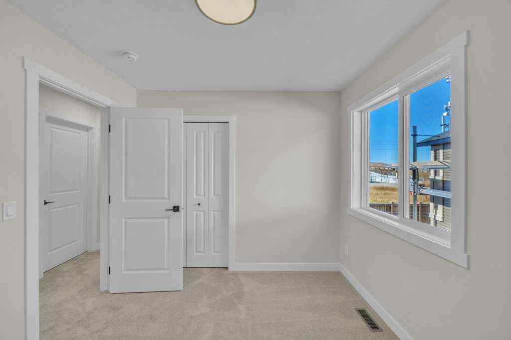 MLS® A2263191 - 203 Homestead Common NE in Homestead Calgary, Residential