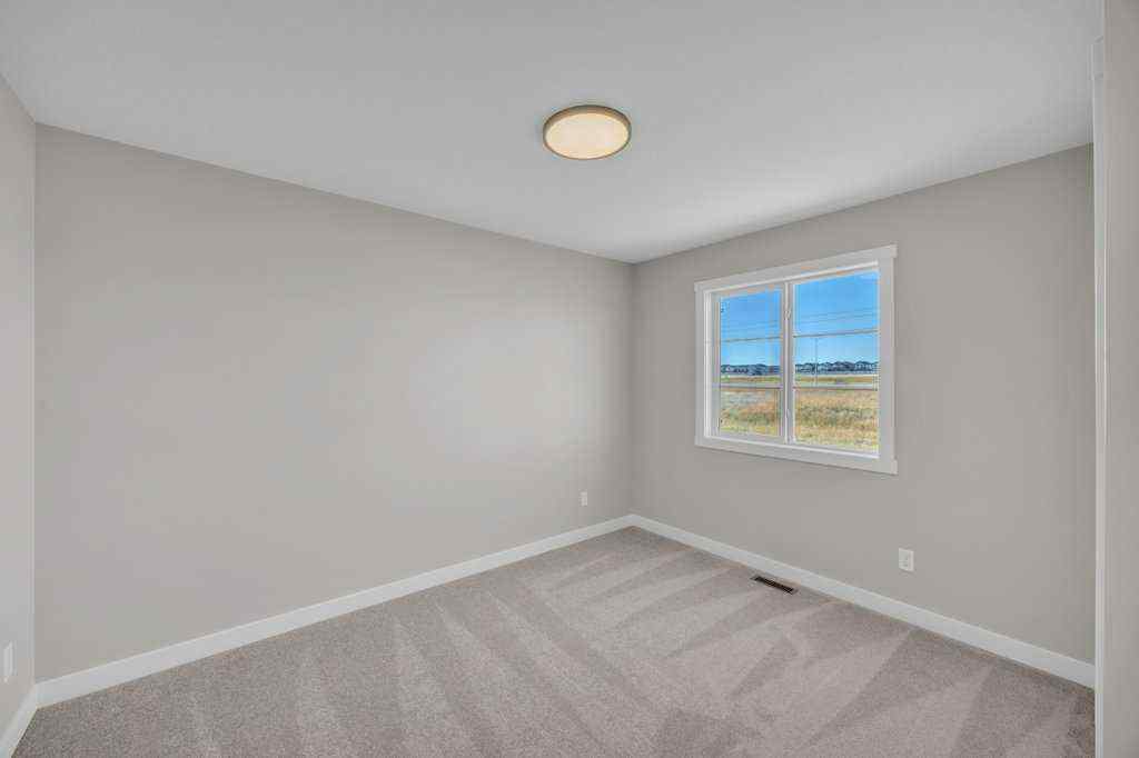 MLS® A2263191 - 203 Homestead Common NE in Homestead Calgary, Residential
