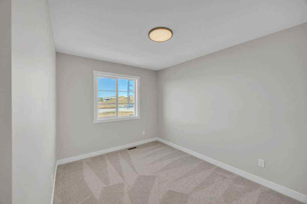 MLS® A2263191 - 203 Homestead Common NE in Homestead Calgary, Residential