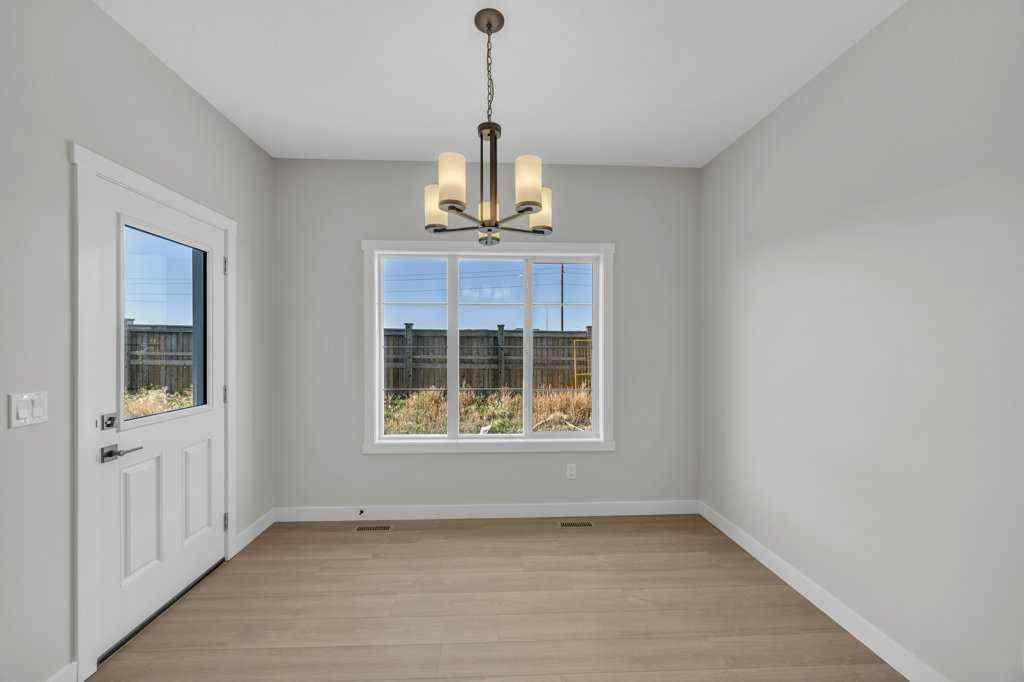MLS® A2263191 - 203 Homestead Common NE in Homestead Calgary, Residential
