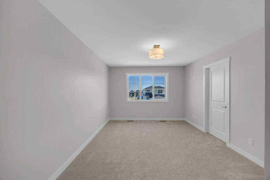 MLS® A2263191 - 203 Homestead Common NE in Homestead Calgary, Residential