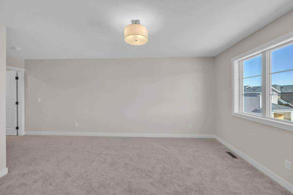 MLS® A2263191 - 203 Homestead Common NE in Homestead Calgary, Residential