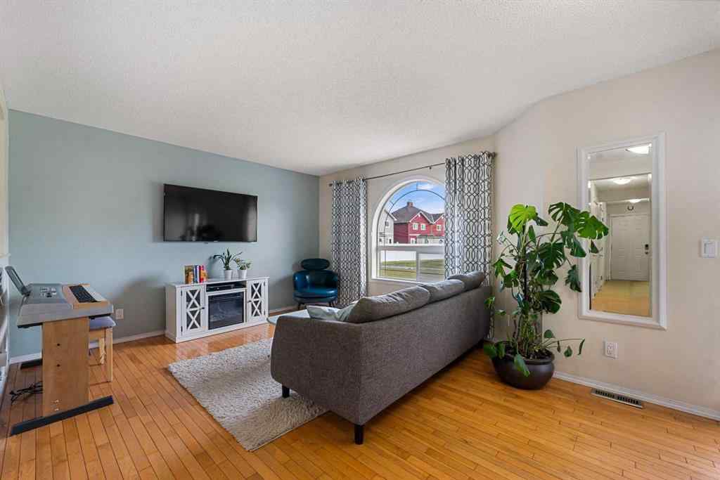 MLS® A2263209 - 205 Bayside Point SW in Bayside Airdrie, Residential