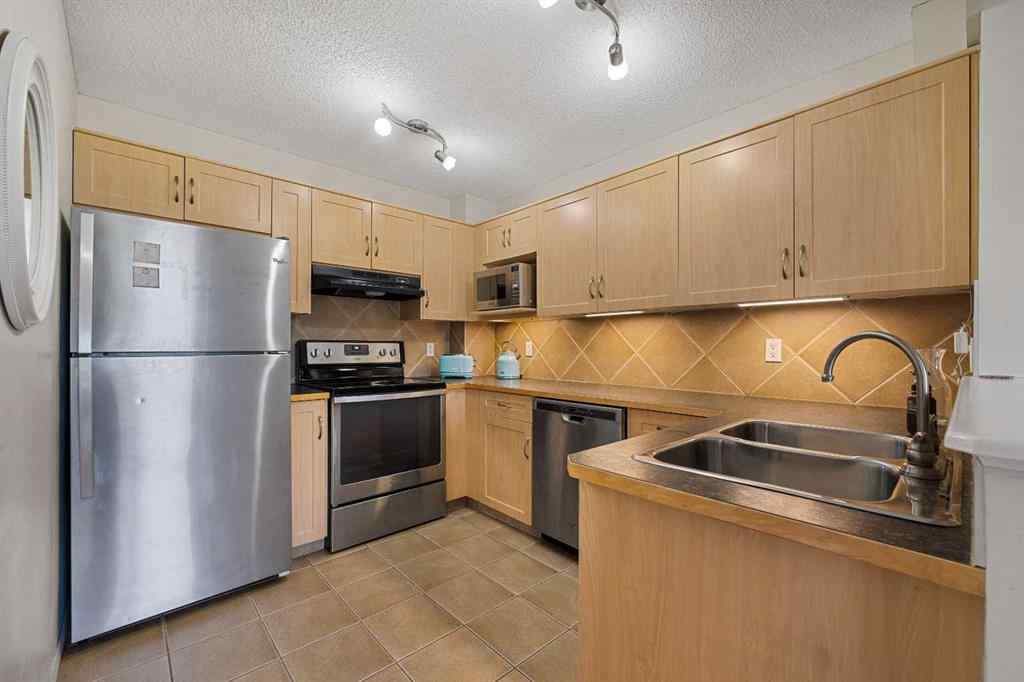 MLS® A2263209 - 205 Bayside Point SW in Bayside Airdrie, Residential