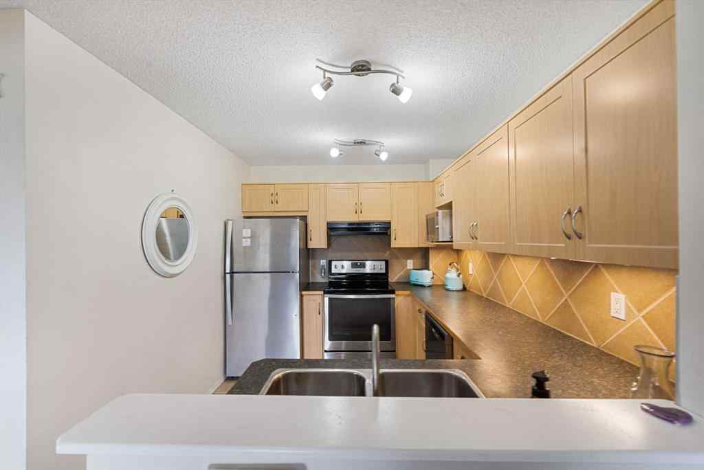 MLS® A2263209 - 205 Bayside Point SW in Bayside Airdrie, Residential