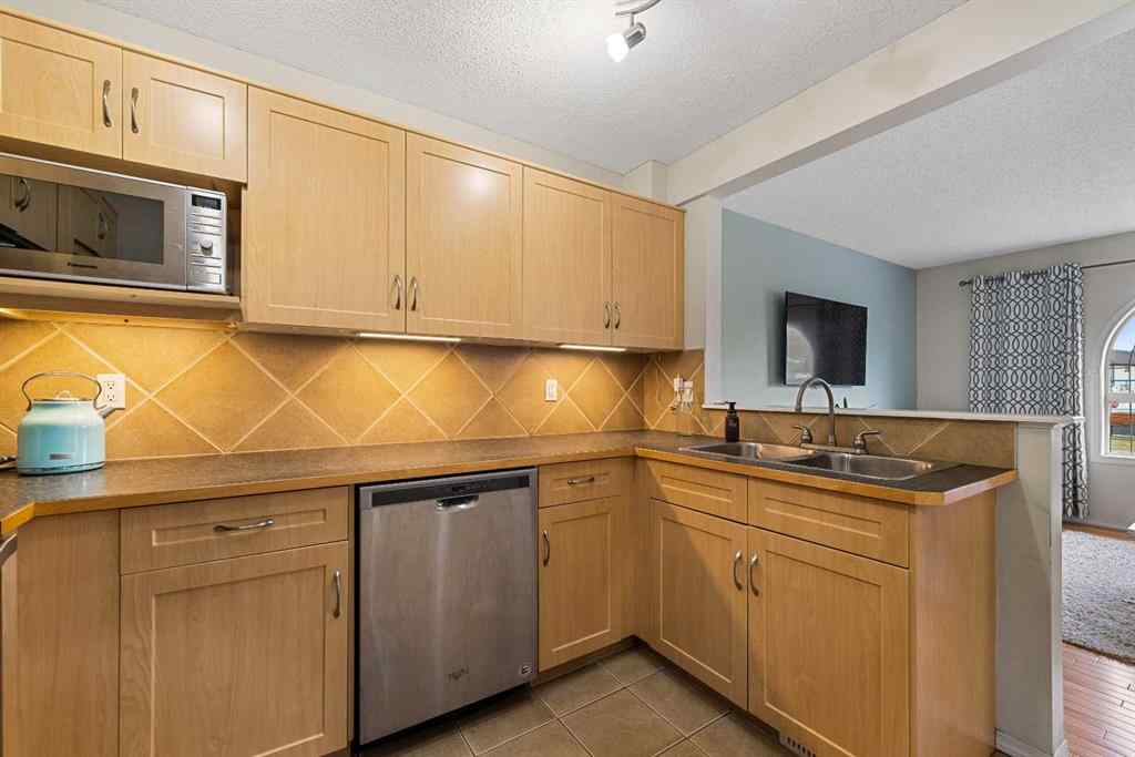 MLS® A2263209 - 205 Bayside Point SW in Bayside Airdrie, Residential