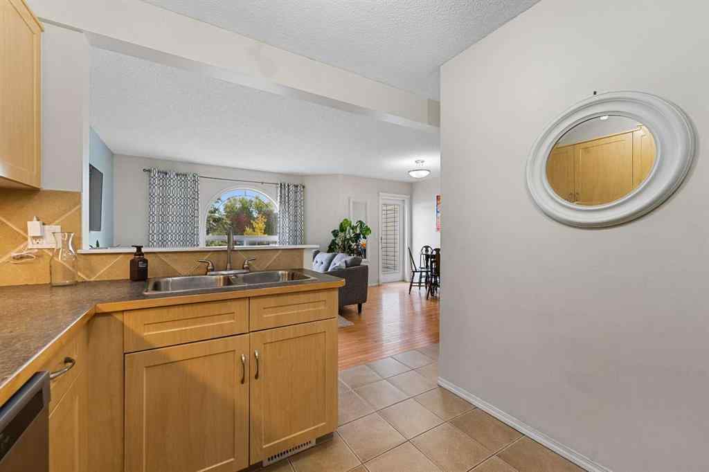 MLS® A2263209 - 205 Bayside Point SW in Bayside Airdrie, Residential