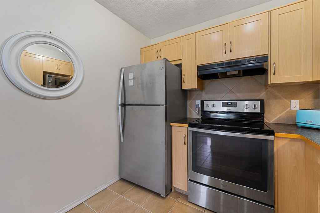 MLS® A2263209 - 205 Bayside Point SW in Bayside Airdrie, Residential