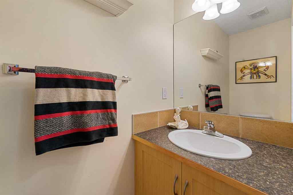 MLS® A2263209 - 205 Bayside Point SW in Bayside Airdrie, Residential