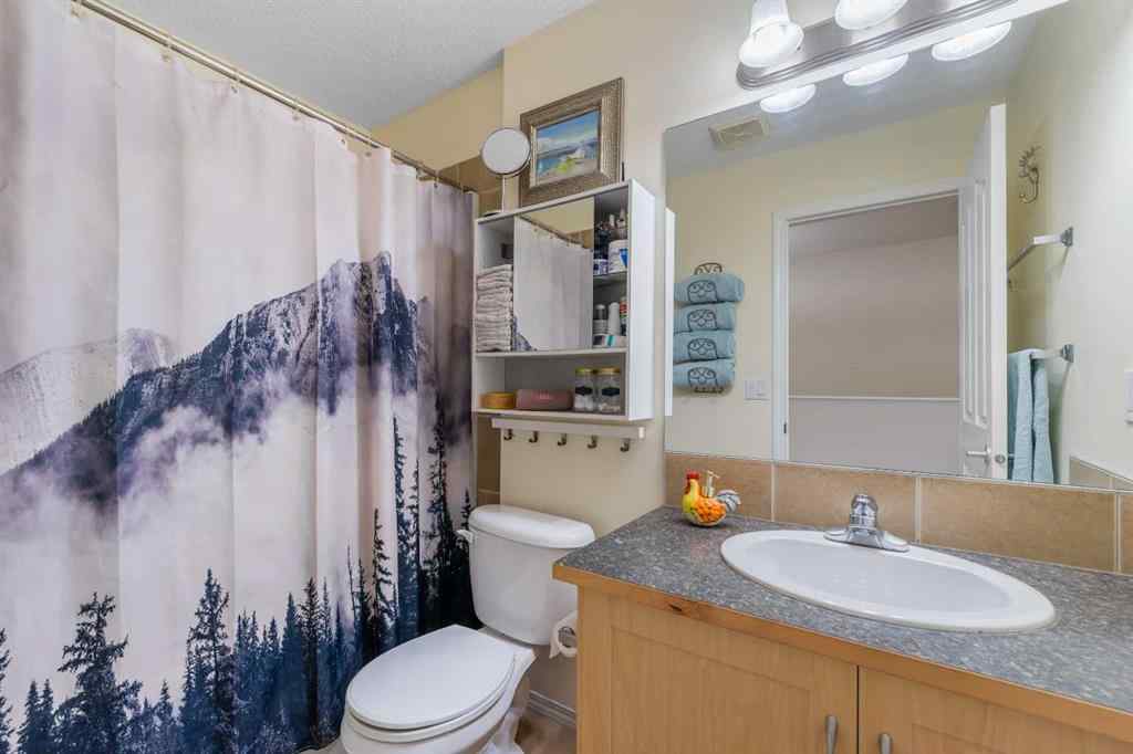 MLS® A2263209 - 205 Bayside Point SW in Bayside Airdrie, Residential