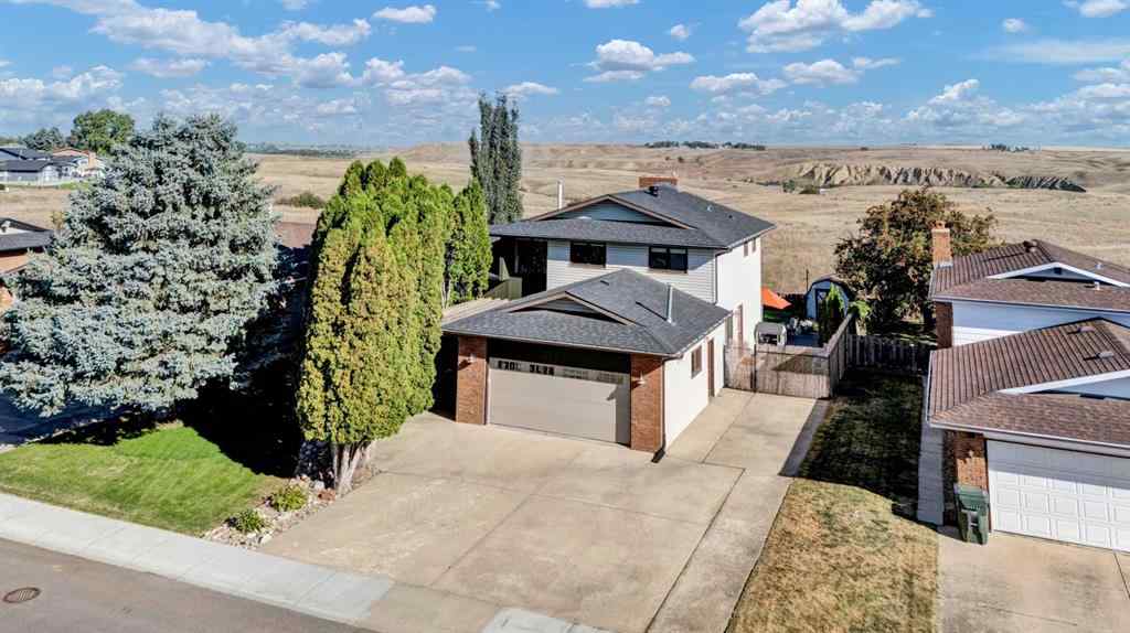 MLS® A2263249 - 84 East Glen Drive SE in Ross Glen Medicine Hat, Residential