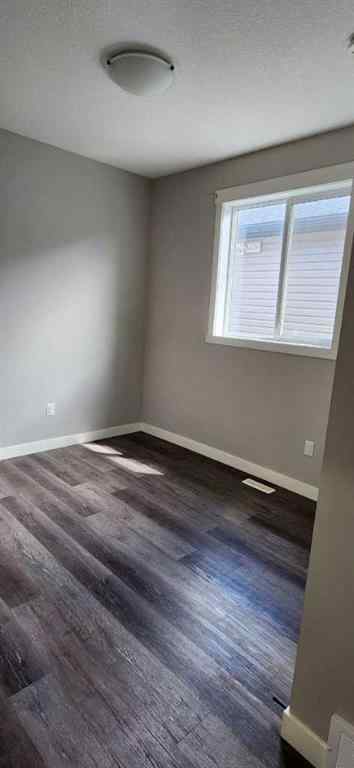 MLS® A2263252 - 9810 89 Street  in Cobblestone Grande Prairie, Residential