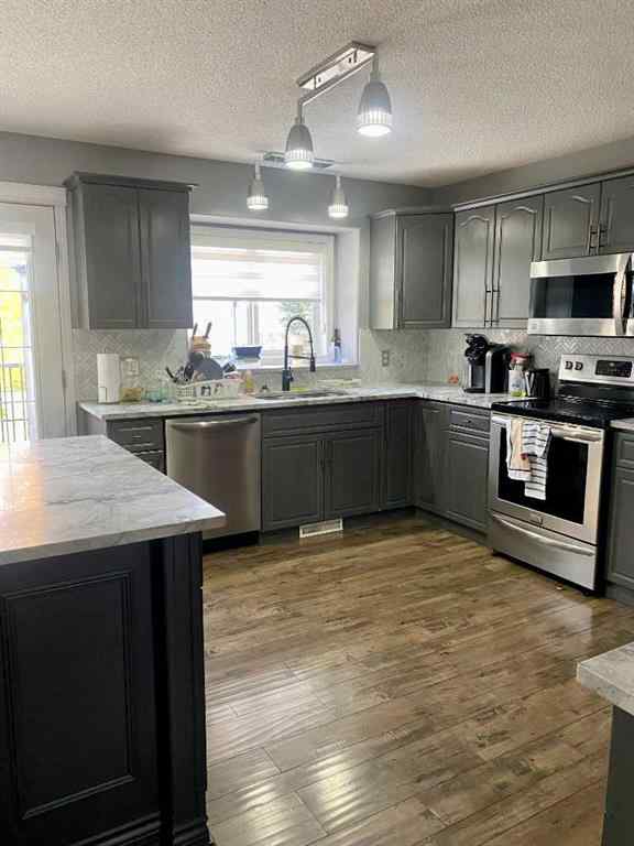 MLS® A2263255 - 205 Smallwood Street  in Timberlea Fort McMurray, Residential