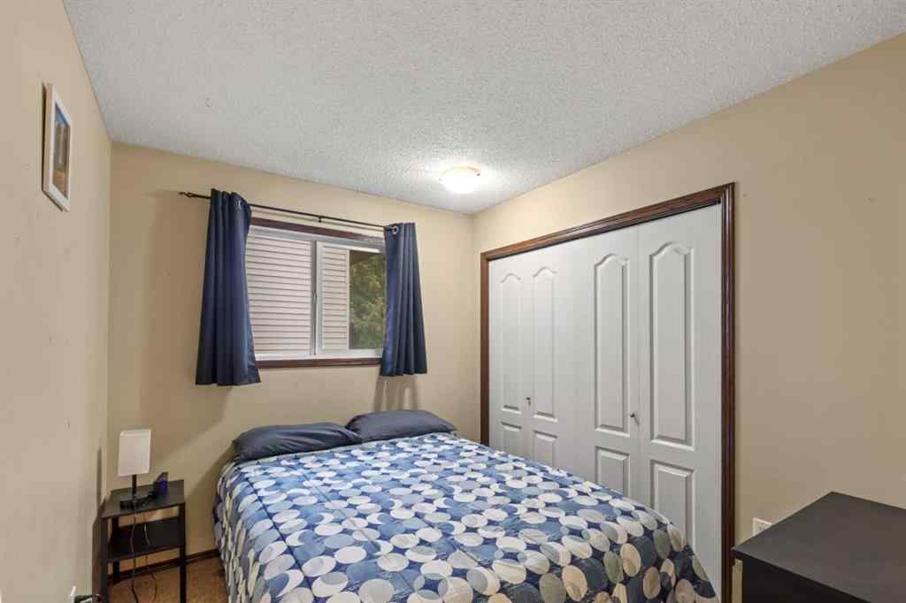 MLS® A2263258 - 9344 67 Avenue  in Country Club Estates Grande Prairie, Residential