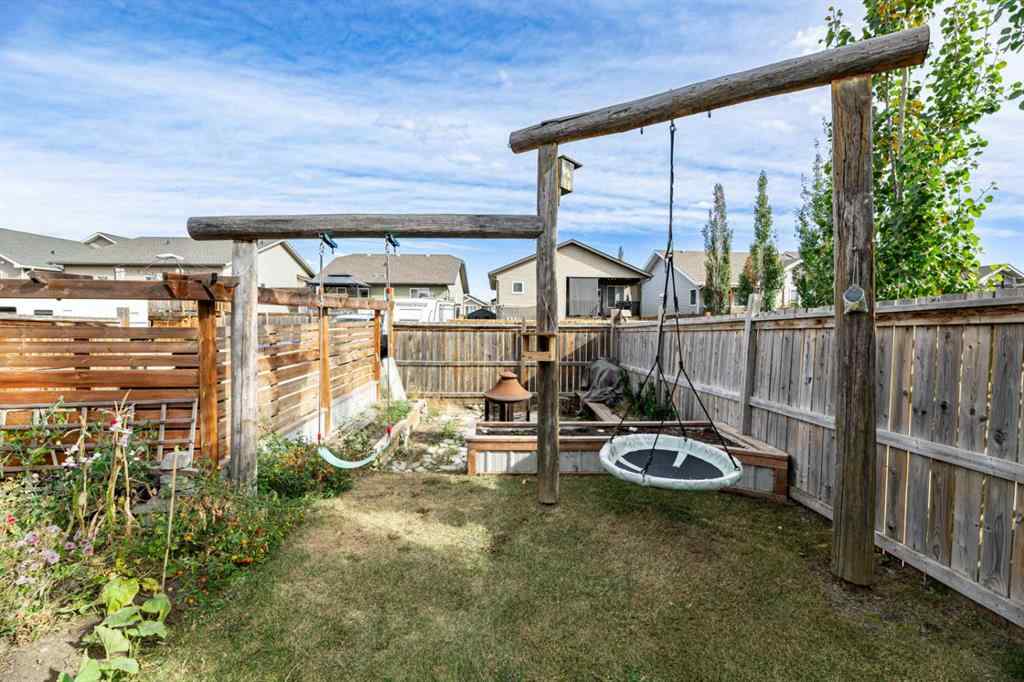 MLS® A2263259 - 45 Coachman Way  in Cottonwood Estates Blackfalds, Residential