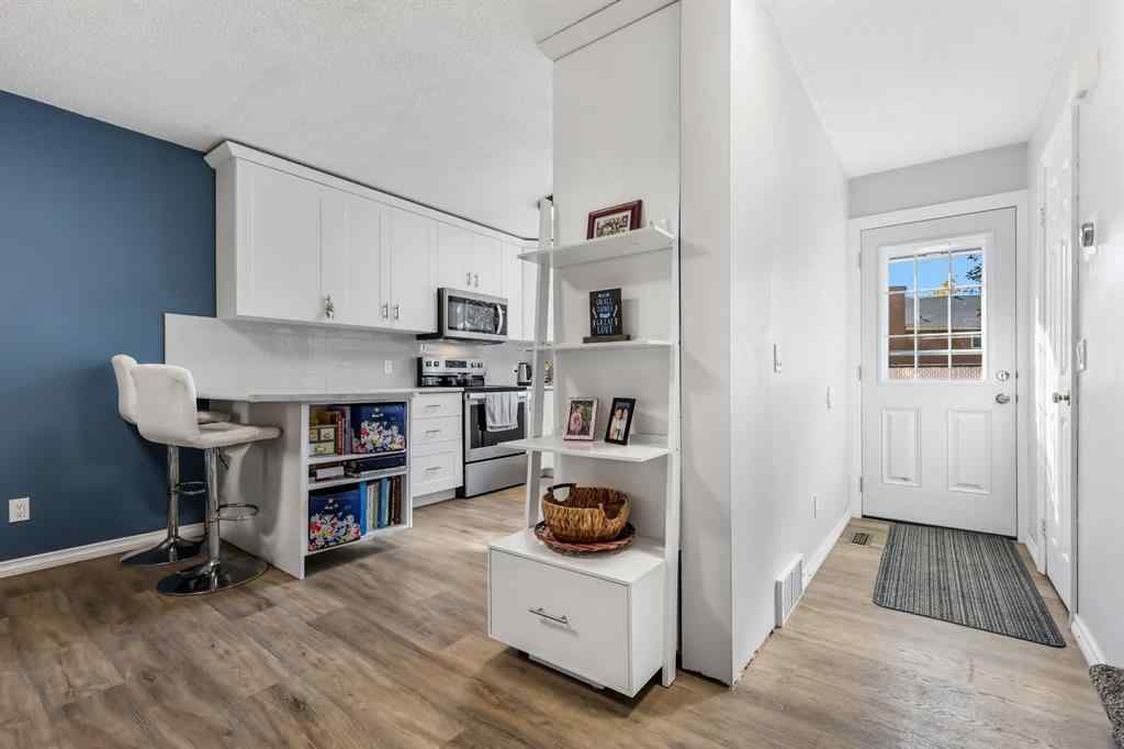 MLS® A2263273 - Unit #8 7 Westland Road  in Westridge Okotoks, Residential