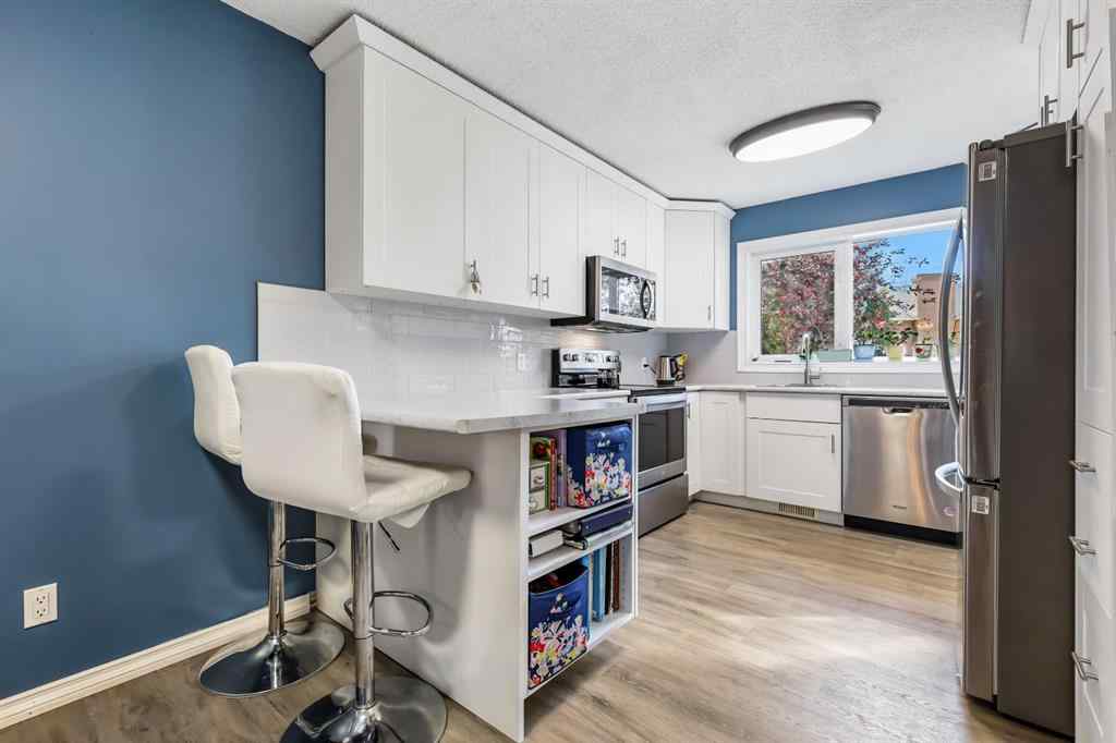 MLS® A2263273 - Unit #8 7 Westland Road  in Westridge Okotoks, Residential