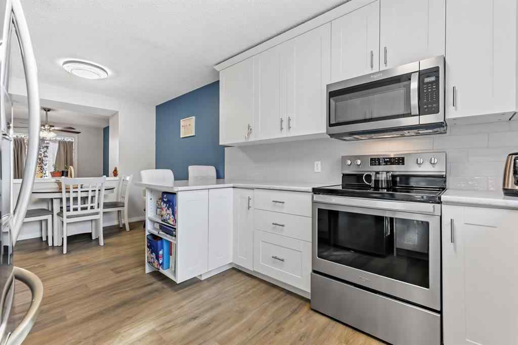 MLS® A2263273 - Unit #8 7 Westland Road  in Westridge Okotoks, Residential