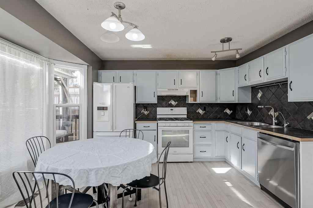 MLS® A2263280 - 72 Strathcona Crescent  in Strathcona Park Calgary, Residential