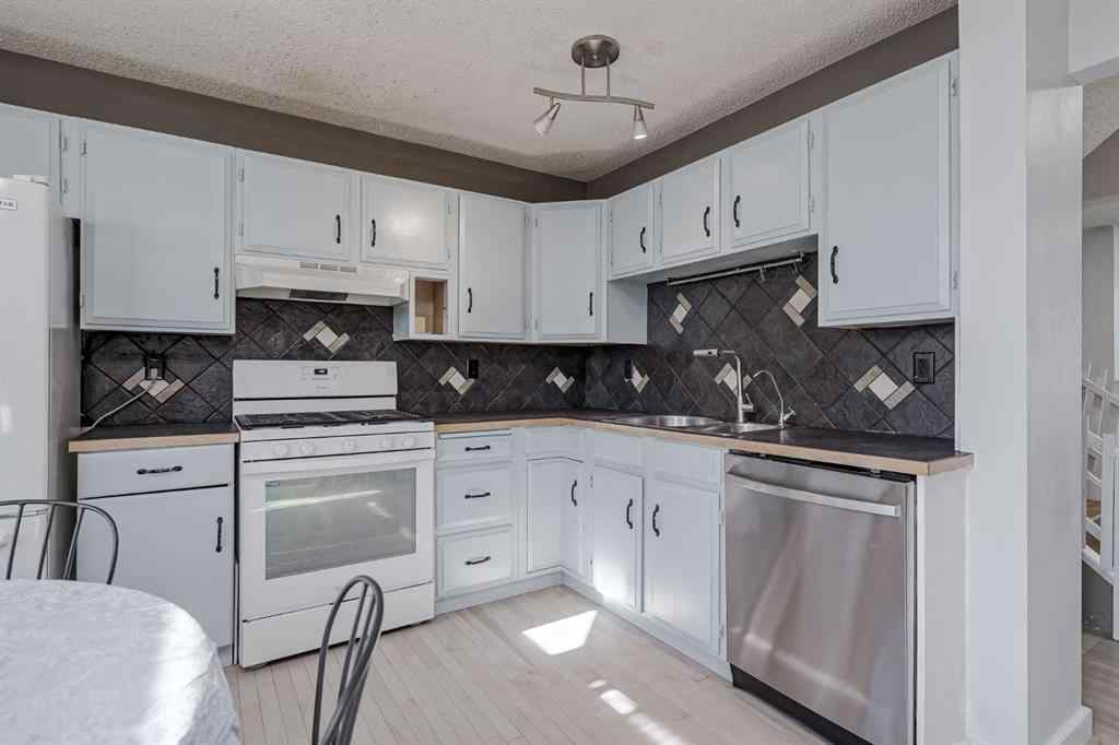 MLS® A2263280 - 72 Strathcona Crescent  in Strathcona Park Calgary, Residential