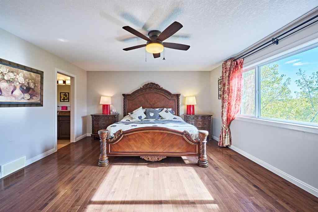 MLS® A2263288 - 8101 9 Avenue SW in West Springs Calgary, Residential