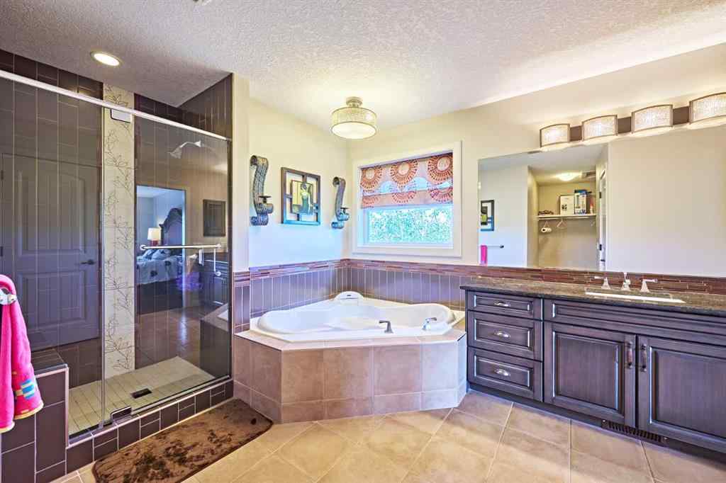 MLS® A2263288 - 8101 9 Avenue SW in West Springs Calgary, Residential