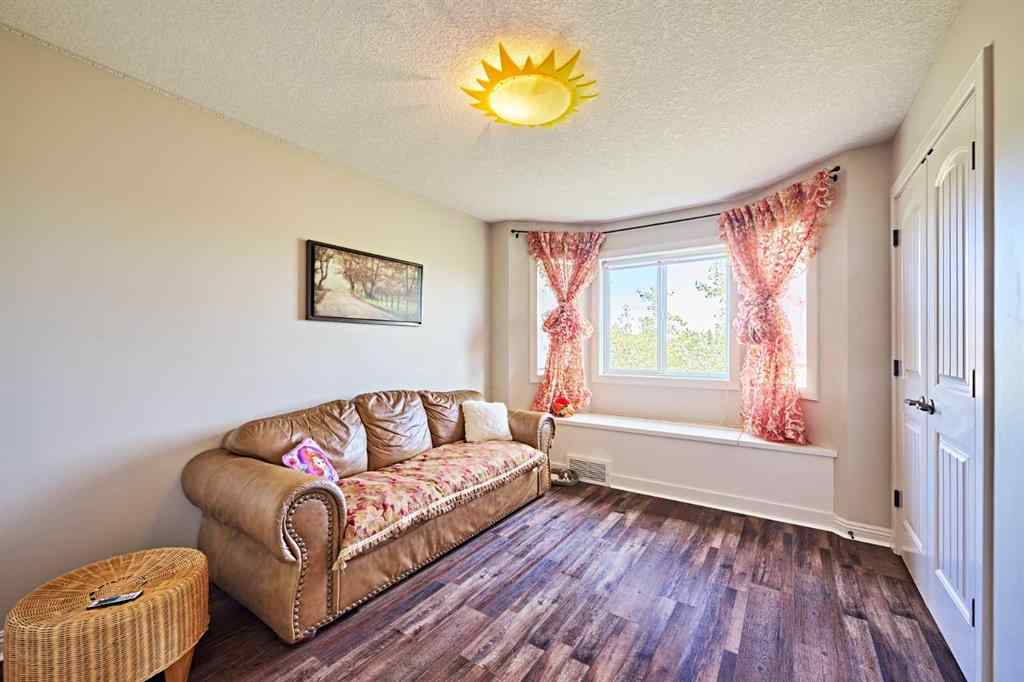 MLS® A2263288 - 8101 9 Avenue SW in West Springs Calgary, Residential