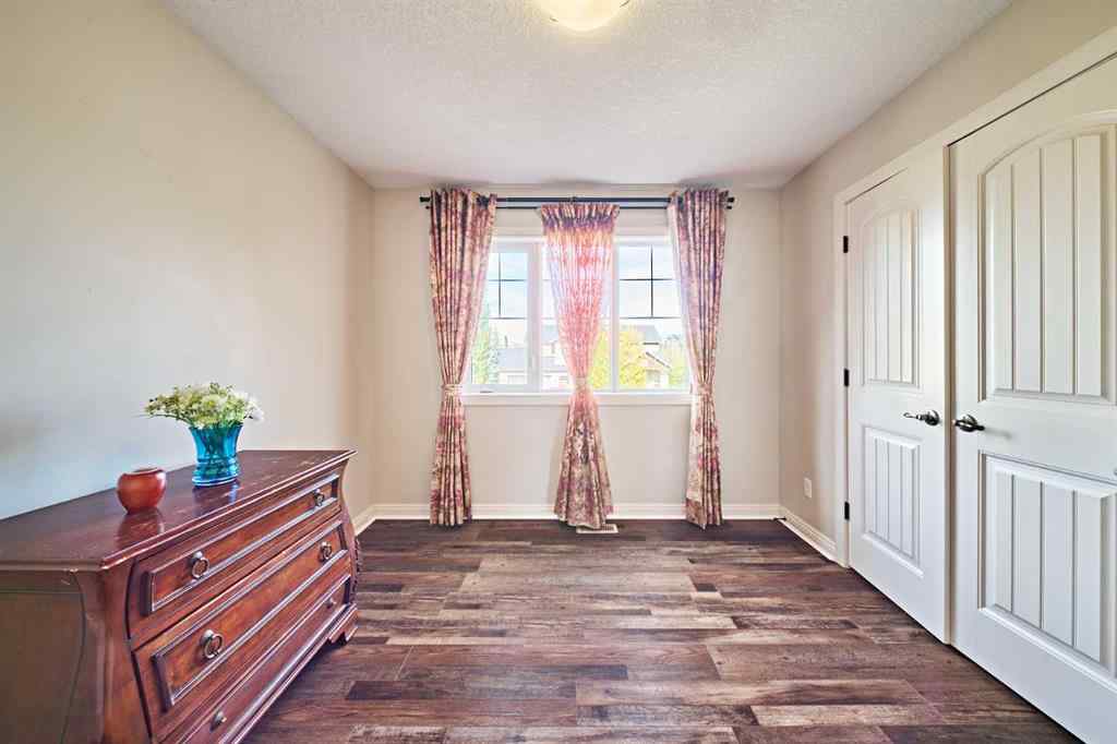 MLS® A2263288 - 8101 9 Avenue SW in West Springs Calgary, Residential