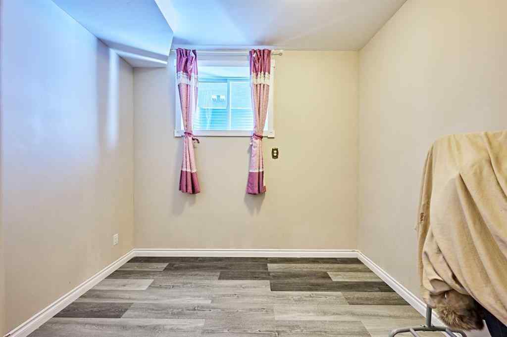 MLS® A2263288 - 8101 9 Avenue SW in West Springs Calgary, Residential