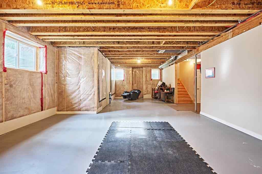 MLS® A2263288 - 8101 9 Avenue SW in West Springs Calgary, Residential