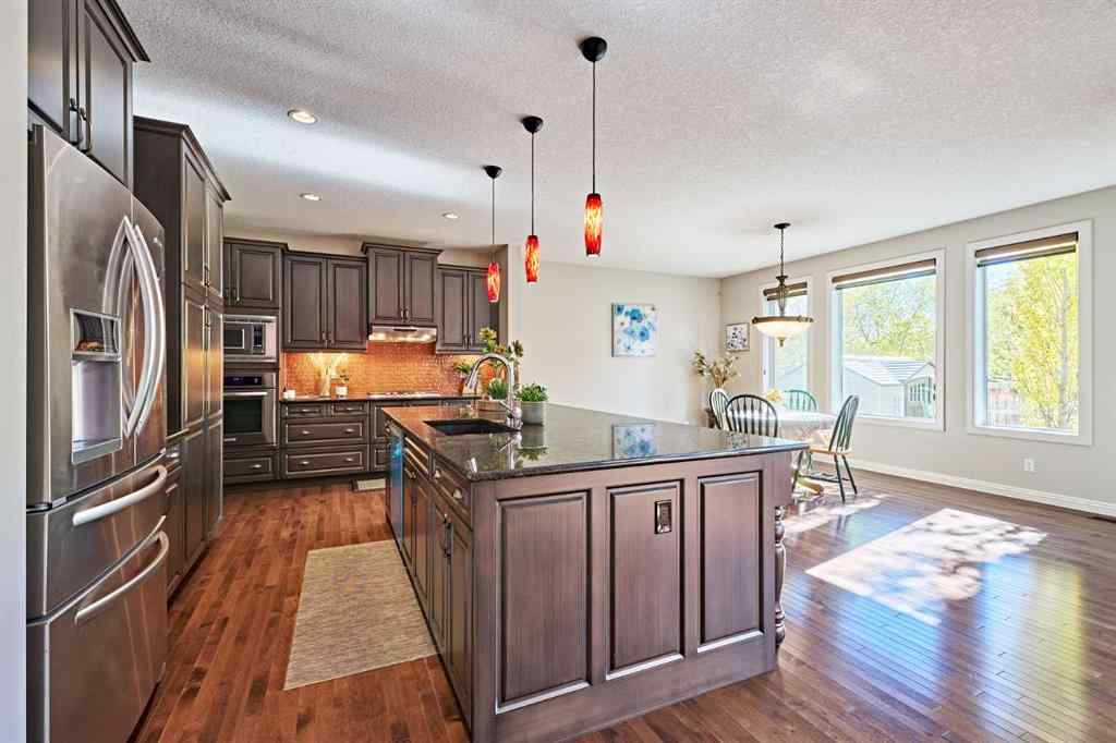 MLS® A2263288 - 8101 9 Avenue SW in West Springs Calgary, Residential