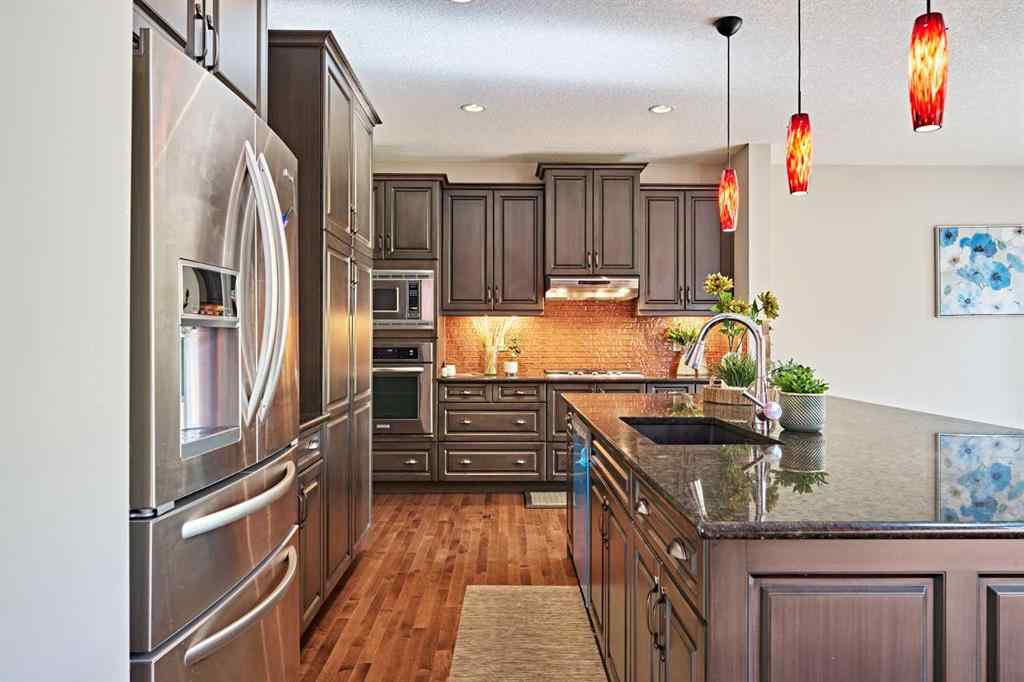 MLS® A2263288 - 8101 9 Avenue SW in West Springs Calgary, Residential