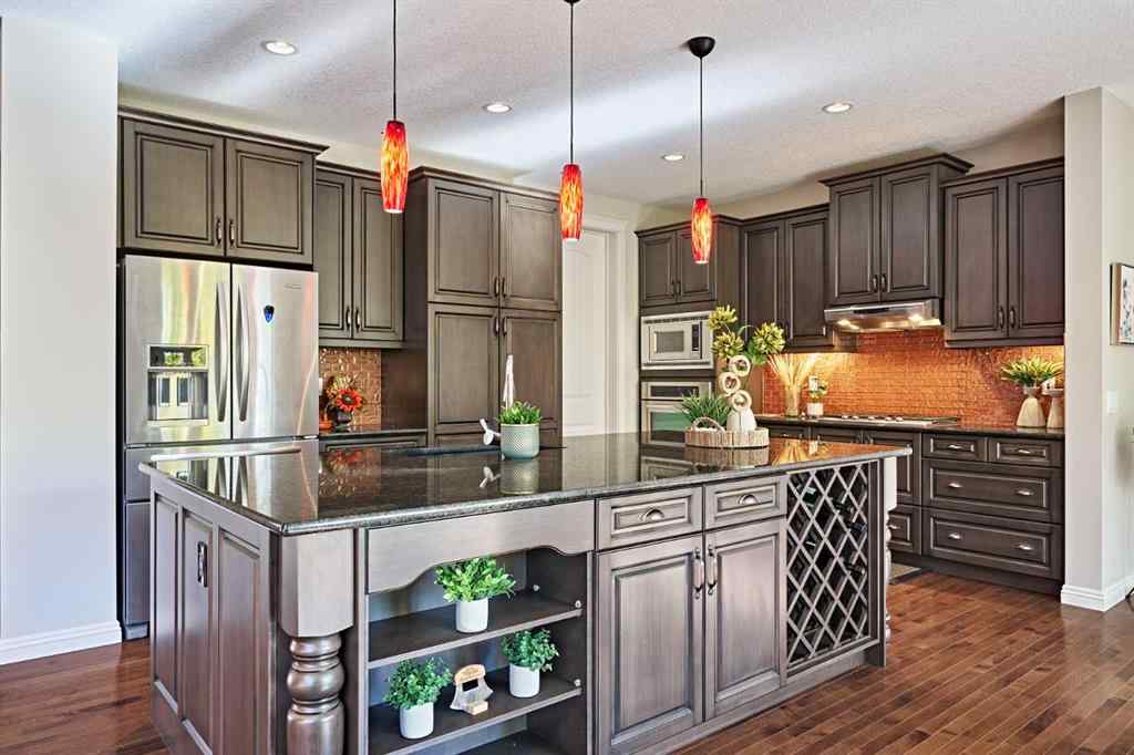 MLS® A2263288 - 8101 9 Avenue SW in West Springs Calgary, Residential