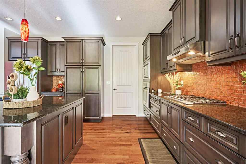 MLS® A2263288 - 8101 9 Avenue SW in West Springs Calgary, Residential