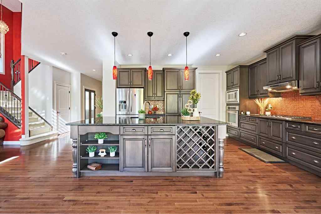 MLS® A2263288 - 8101 9 Avenue SW in West Springs Calgary, Residential