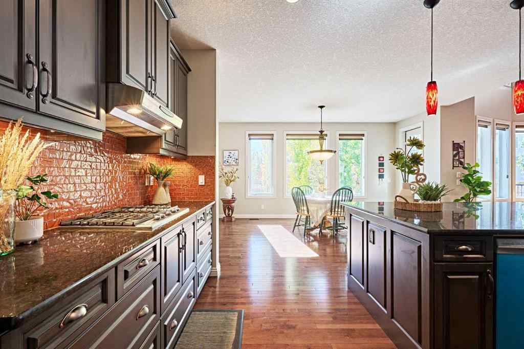 MLS® A2263288 - 8101 9 Avenue SW in West Springs Calgary, Residential