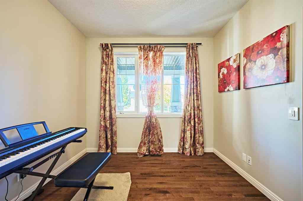 MLS® A2263288 - 8101 9 Avenue SW in West Springs Calgary, Residential