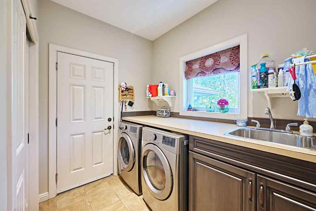 MLS® A2263288 - 8101 9 Avenue SW in West Springs Calgary, Residential