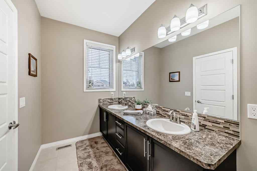 MLS® A2263323 - 132 Waterlily Cove  in Lakepointe Chestermere, Residential