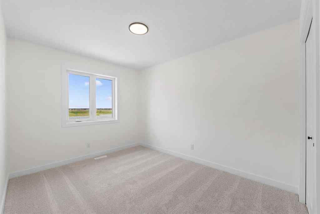 MLS® A2263338 - 437 Hotchkiss Drive SE in Hotchkiss Calgary, Residential