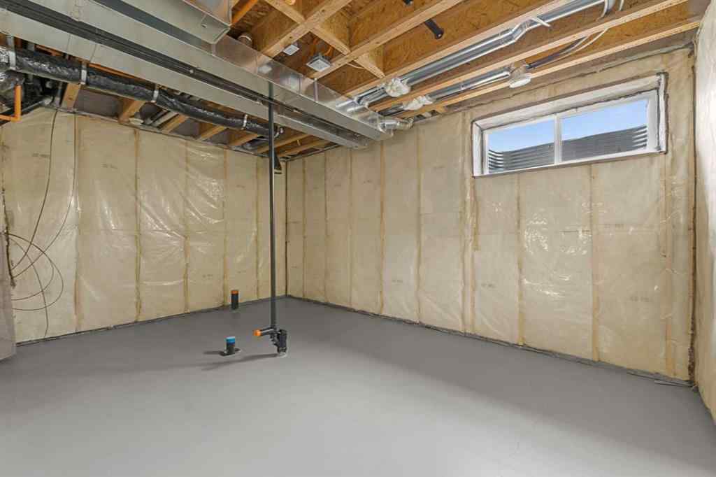 MLS® A2263338 - 437 Hotchkiss Drive SE in Hotchkiss Calgary, Residential