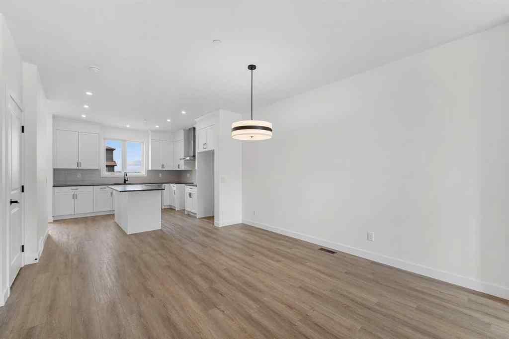 MLS® A2263338 - 437 Hotchkiss Drive SE in Hotchkiss Calgary, Residential