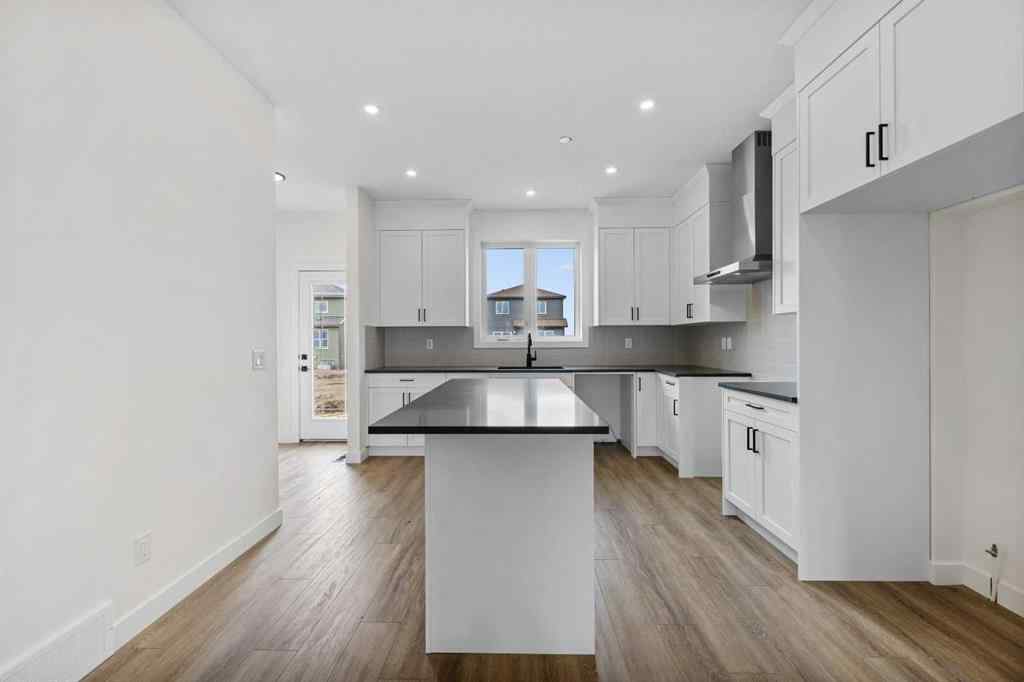 MLS® A2263338 - 437 Hotchkiss Drive SE in Hotchkiss Calgary, Residential