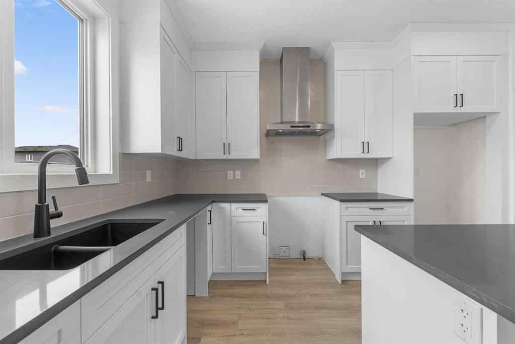 MLS® A2263338 - 437 Hotchkiss Drive SE in Hotchkiss Calgary, Residential