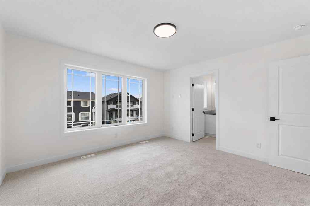 MLS® A2263338 - 437 Hotchkiss Drive SE in Hotchkiss Calgary, Residential